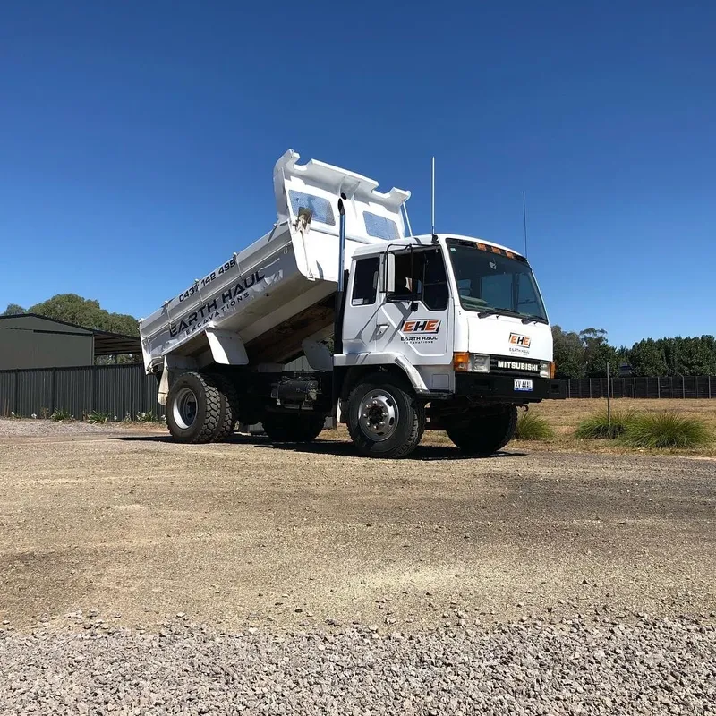 Earth Haul Excavations branded Mitsubishi tipper truck on a rural Benalla property
